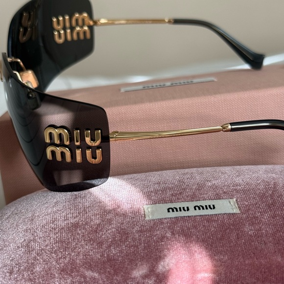 Miu Miu wrap Sunglasses in dark purple lenses & Gold arms & logo New/ full set